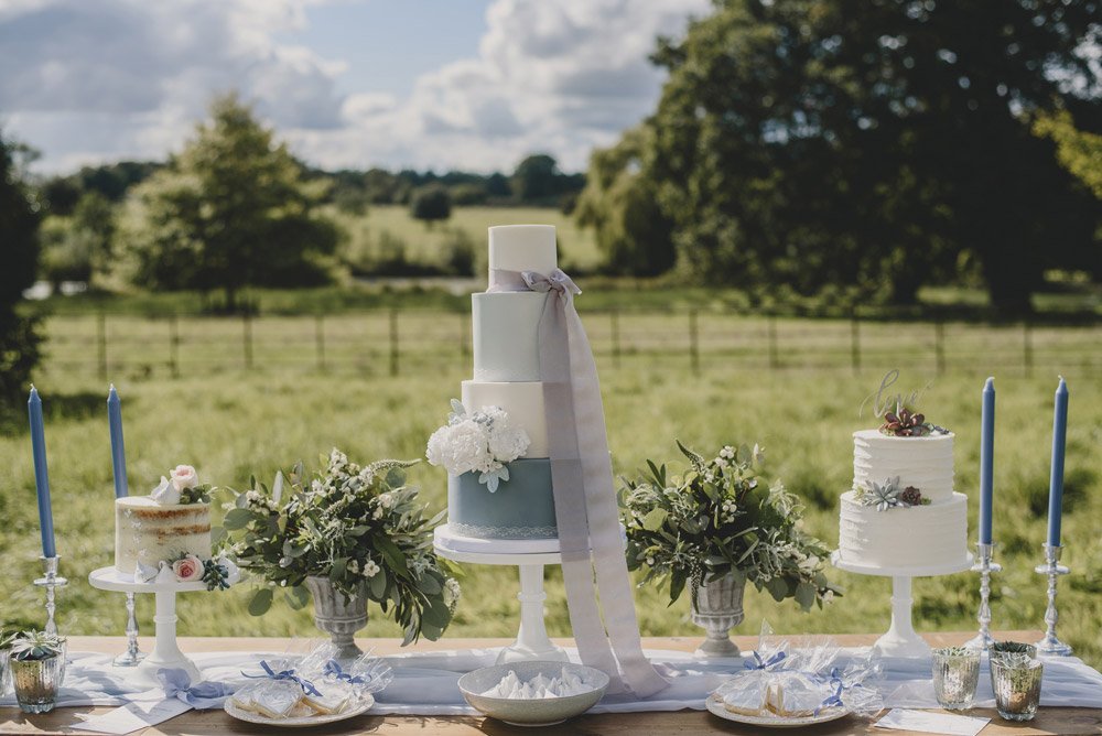 Blue and grey four tier wedding cake